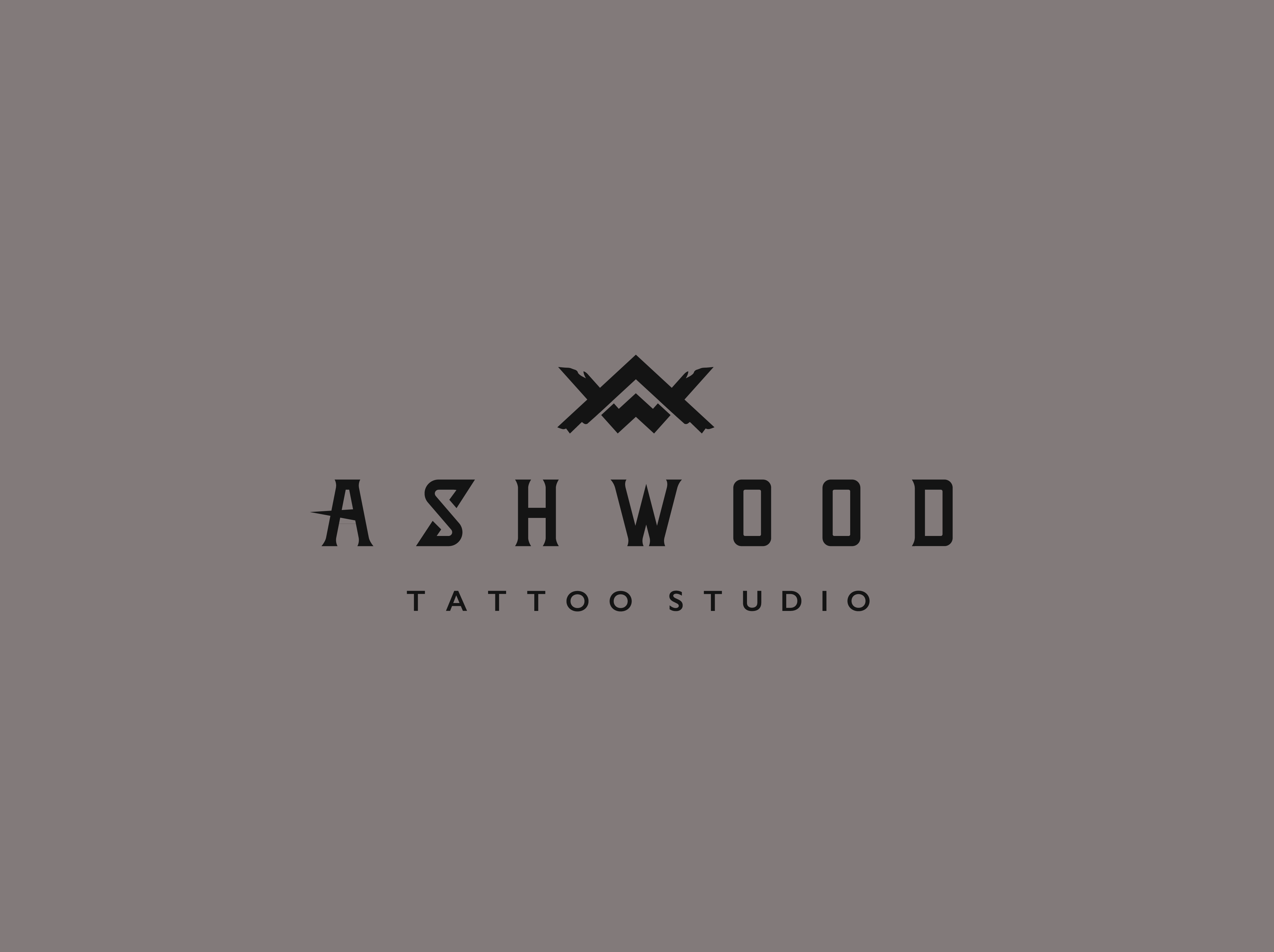Ashwood Tattoo Studio — logo lockup on grey background