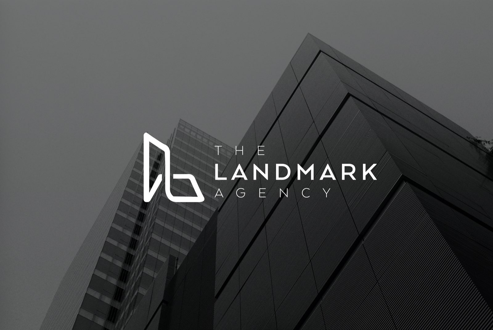The Landmark Agency mark on exterior building signage