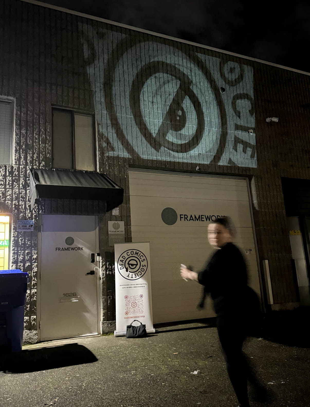 Logo projected on Framework building