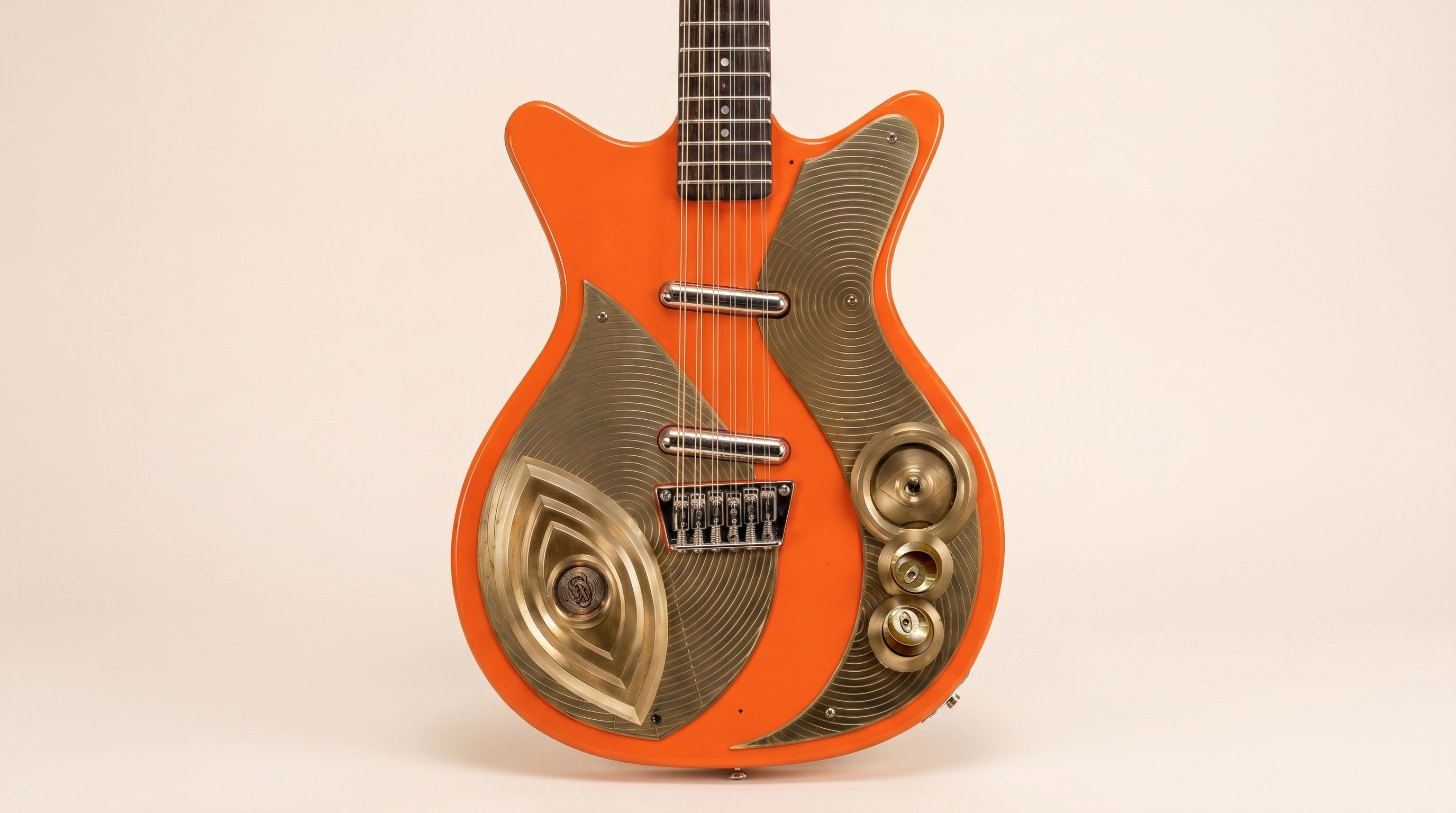 Custom 12-string Danelectro — orange lacquer with brass pickguard system
