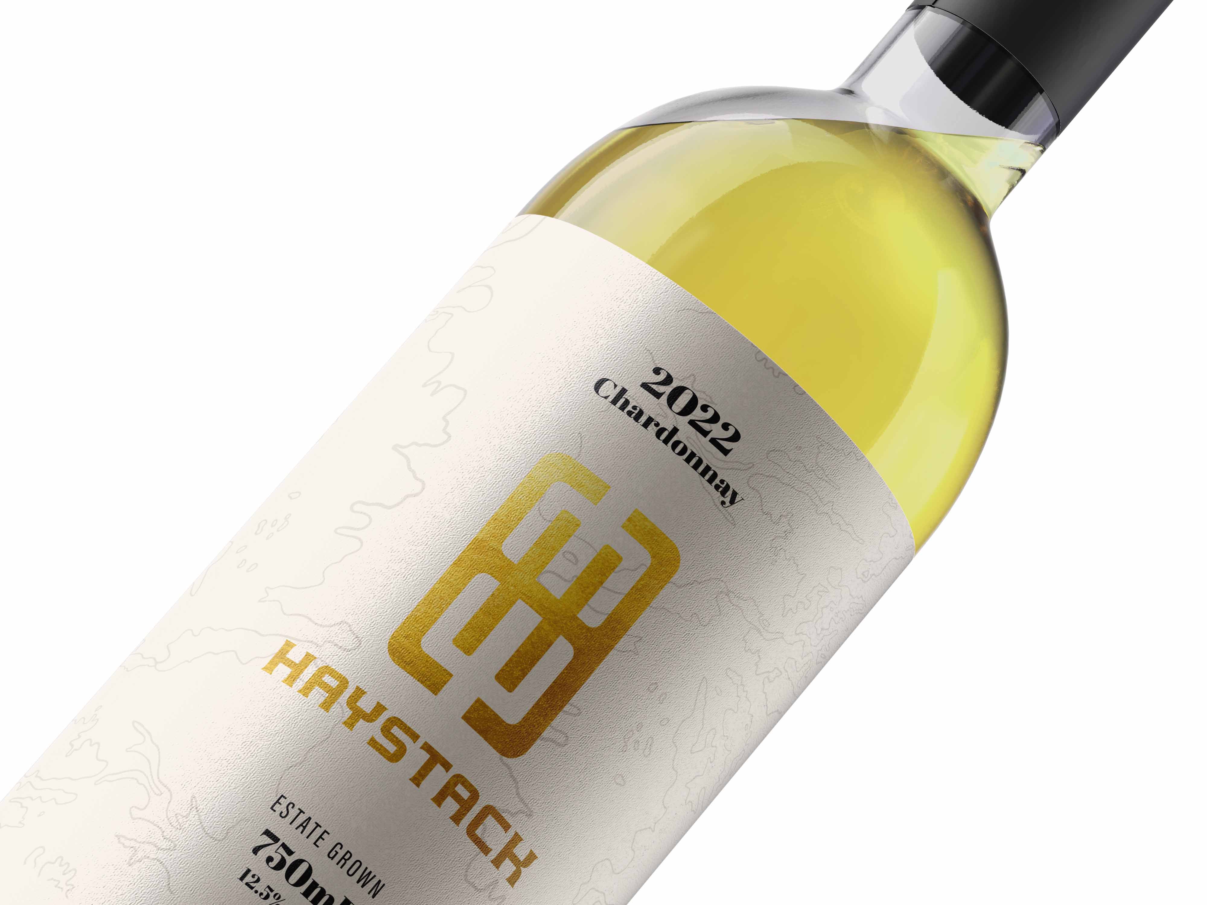Haystack Chardonnay label detail with gold monogram